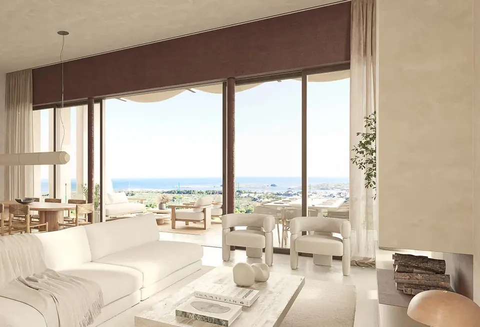 Wohnzimmer mit Zugang zur Terrasse und Meerblick